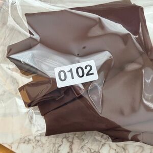 SOLD. SKIMS Body Plunge Bodysuit Cocoa Brown Size M NWT Shapewear Thong